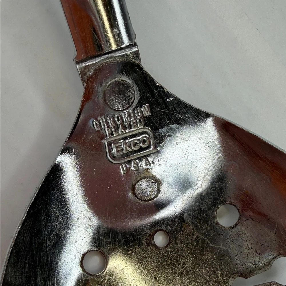 Vintage EKCO Chromium Plated Slotted Spoon with Cream Handle